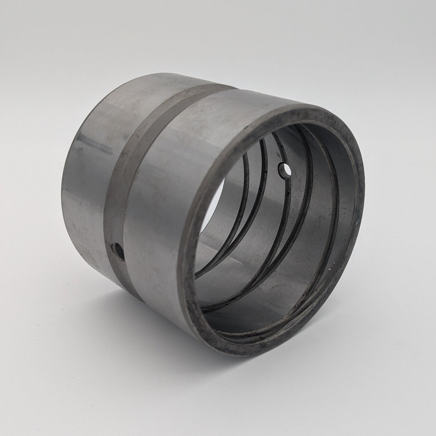 Stahlbuchse 140x160x132 mit Außenringnut und Innenkreuzdrall, beidseitig auslaufend