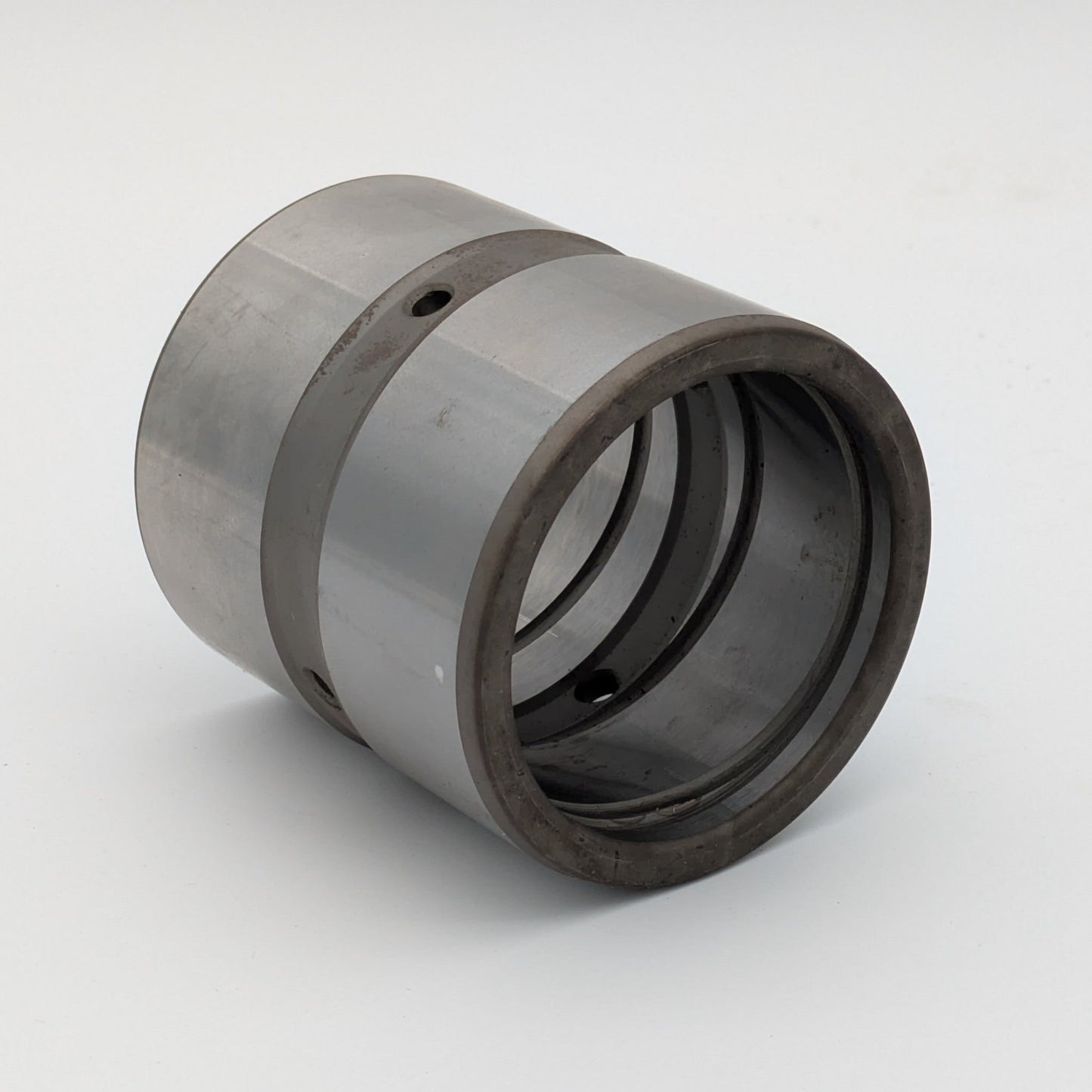 Stahlbuchse 120x135x110 mit Außenringnut, Innenringnut und Innenschmierdrall, beidseitig nicht auslaufend