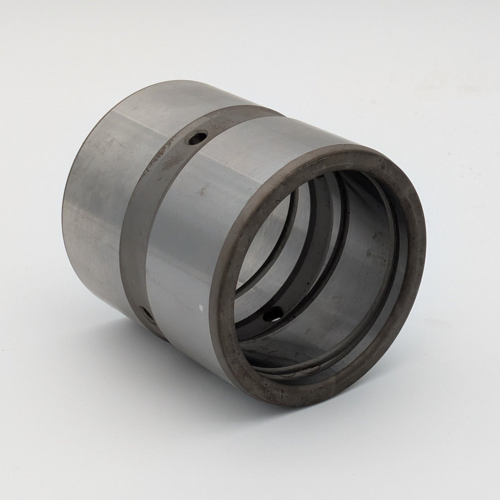Stahlbuchse 120x135x110 mit Außenringnut, Innenringnut und Innenschmierdrall, beidseitig nicht auslaufend